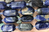 NUGG11 15 inches 12*25mm – 13*28mm faceted nuggets sodalite beads