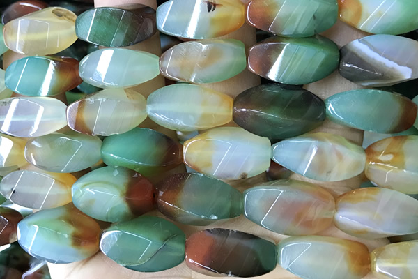 AGAT297 15 inches 10*20mm faceted twisted rice rainbow agate beads