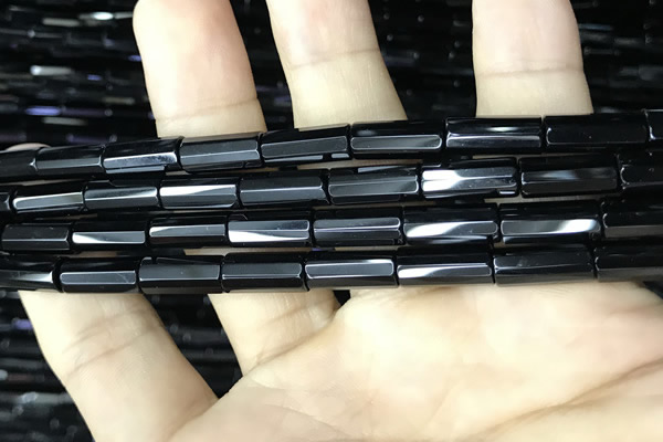 CAA2475 15.5 inches 6*12mm faceted tube black agate beads