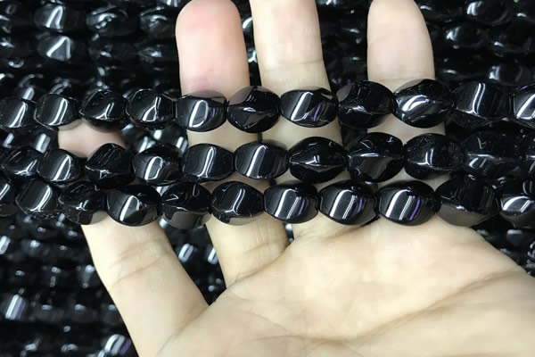 CAA2485 15.5 inches 8*12mm twisted rice black agate beads