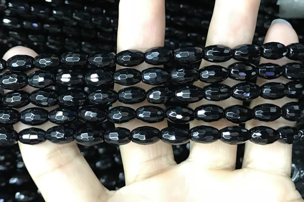 CAA2498 15.5 inches 6*9mm faceted rice black agate beads wholesale