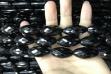 CAA2507 15.5 inches 15*30mm faceted rice black agate beads wholesale