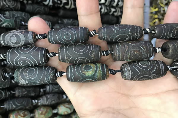 CAA2673 15.5 inches 12*30mm - 14*30mm rice tibetan agate dzi beads