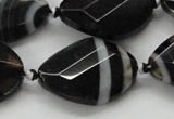 CAA286 22*30mm twisted & faceted oval black line agate beads