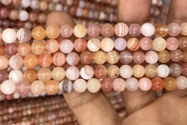 CAA3532 15.5 inches 6mm round pink botswana agate beads