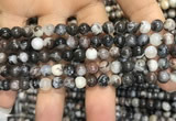 CAA3591 15.5 inches 4mm round black zebra agate beads wholesale