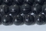 CAA3660 15.5 inches 6mm round matte & carved black agate beads