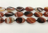 CAA4301 15.5 inches 25*30mm twisted oval line agate beads