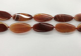 CAA4311 15.5 inches 25*50mm twisted oval line agate beads