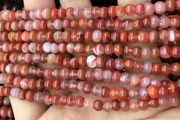 CAA4560 15.5 inches 4*5mm rondelle south red agate beads