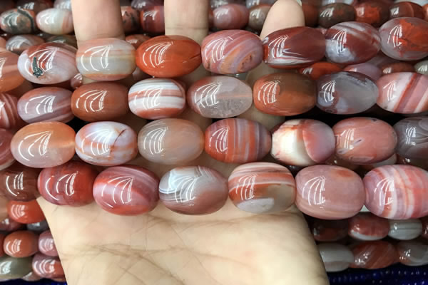 CAA4571 15.5 inches 13*16mm - 15*20mm rice south red agate beads