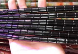 CAA4999 15.5 inches 8*12mm tube black agate beads wholesale