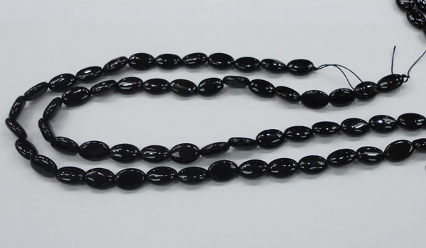 CAB318 15.5 inches 8*12mm oval black agate gemstone beads wholesale