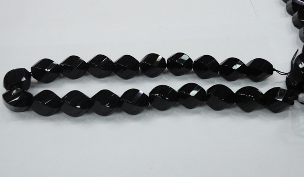 CAB338 15.5 inches 18*24mm faceted & twisted rice black agate beads