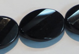 CAB816 15.5 inches 22*30mm faceted & twisted oval black agate beads