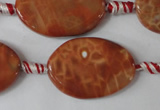 CAG1590 15.5 inches 20*30mm twisted oval fire crackle agate beads