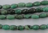 CAG1605 15.5 inches 6*9mm faceted rice green grass agate beads