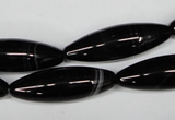 CAG2969 15.5 inches 10*30mm rice black line agate beads