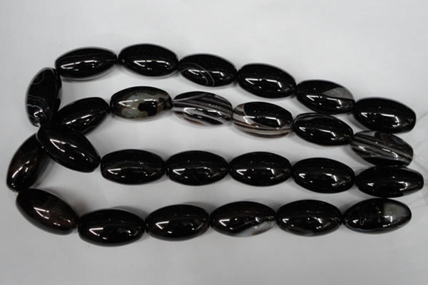 CAG2970 15.5 inches 15*30mm rice black line agate beads