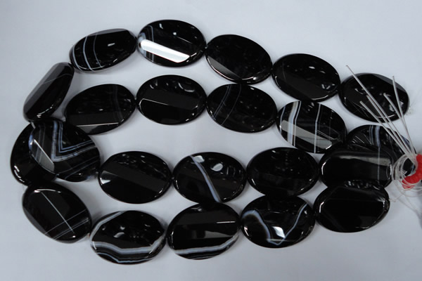 CAG3087 15.5 inches 25*35mm faceted oval black line agate beads