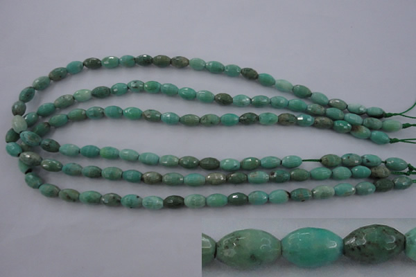 CAG3918 15.5 inches 6*10mm faceted rice green grass agate beads