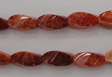 CAG4181 15.5 inches 7*14mm faceted & twisted rice natural fire agate beads