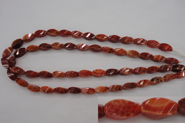 CAG4181 15.5 inches 7*14mm faceted & twisted rice natural fire agate beads