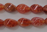 CAG4184 15.5 inches 6*10mm twisted rice natural fire agate beads