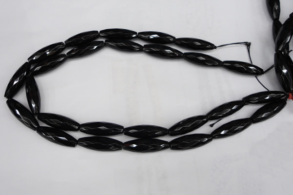 CAG5062 15.5 inches 10*30mm faceted rice black agate beads