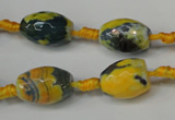 CAG5774 15 inches 10*14mm faceted rice fire crackle agate beads