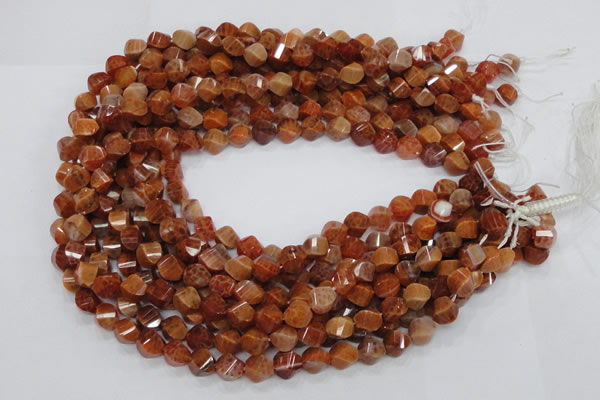 CAG580 15.5 inches 8*10mm faceted & twisted rice natural fire agate beads