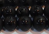 CAG6004 15.5 inches 12mm carved round matte black agate beads