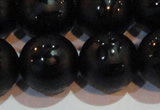 CAG6005 15.5 inches 14mm carved round matte black agate beads