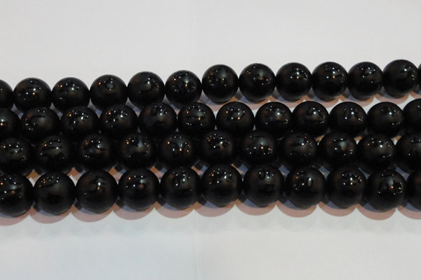 CAG6005 15.5 inches 14mm carved round matte black agate beads