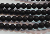 CAG6010 15.5 inches 4mm round matte black agate beads