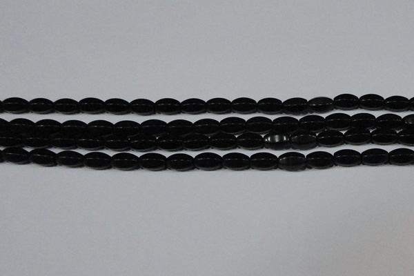 CAG6029 15.5 inches 6*10mm faceted rice matte black agate beads