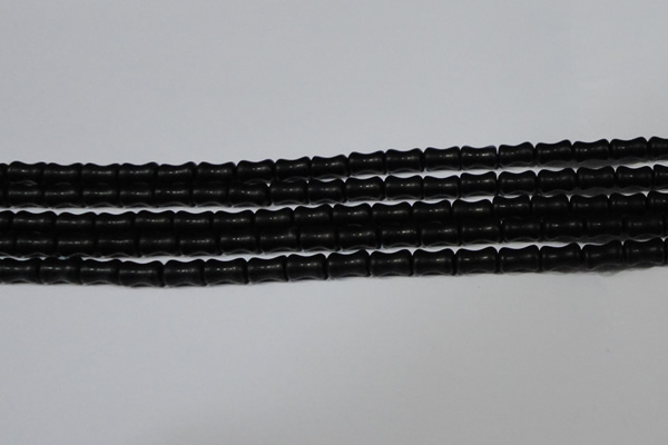 CAG6038 15.5 inches 4*8mm bone matte black agate beads