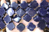 CARV06 15 inches 17mm – 18mm carved flower blue goldstone beads