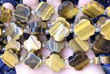 CARV09 15 inches 17mm – 18mm carved flower yellow tiger eye beads