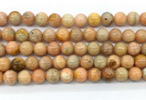 CCA553 15.5 inches 10mm round peach calcite gemstone beads