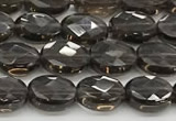 CCB922 15.5 inches 6*8mm faceted oval smoky quartz beads