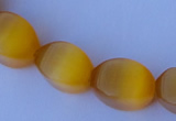 CCT26 14 inches 10*14mm twisted honey yellow cats eye beads wholesale