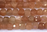 CCU885 15 inches 4mm faceted cube sunstone beads