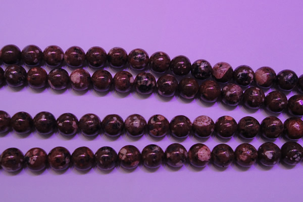 CDM53 15 inches 10mm round strawberry dalmatian jasper beads