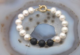 CFB1080 Hand-knotted 9mm - 10mm potato white freshwater pearl & black lava bracelet