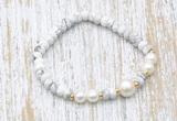 CFB702 faceted rondelle white howlite & potato white freshwater pearl stretchy bracelet