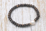 CFB754 faceted rondelle bronzite & potato white freshwater pearl stretchy bracelet