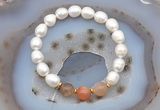 CFB913 9mm - 10mm rice white freshwater pearl & rainbow moonstone stretchy bracelet