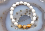 CFB914 9mm - 10mm rice white freshwater pearl & golden tiger eye stretchy bracelet