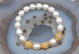 CFB928 9mm - 10mm rice white freshwater pearl & honey jade stretchy bracelet